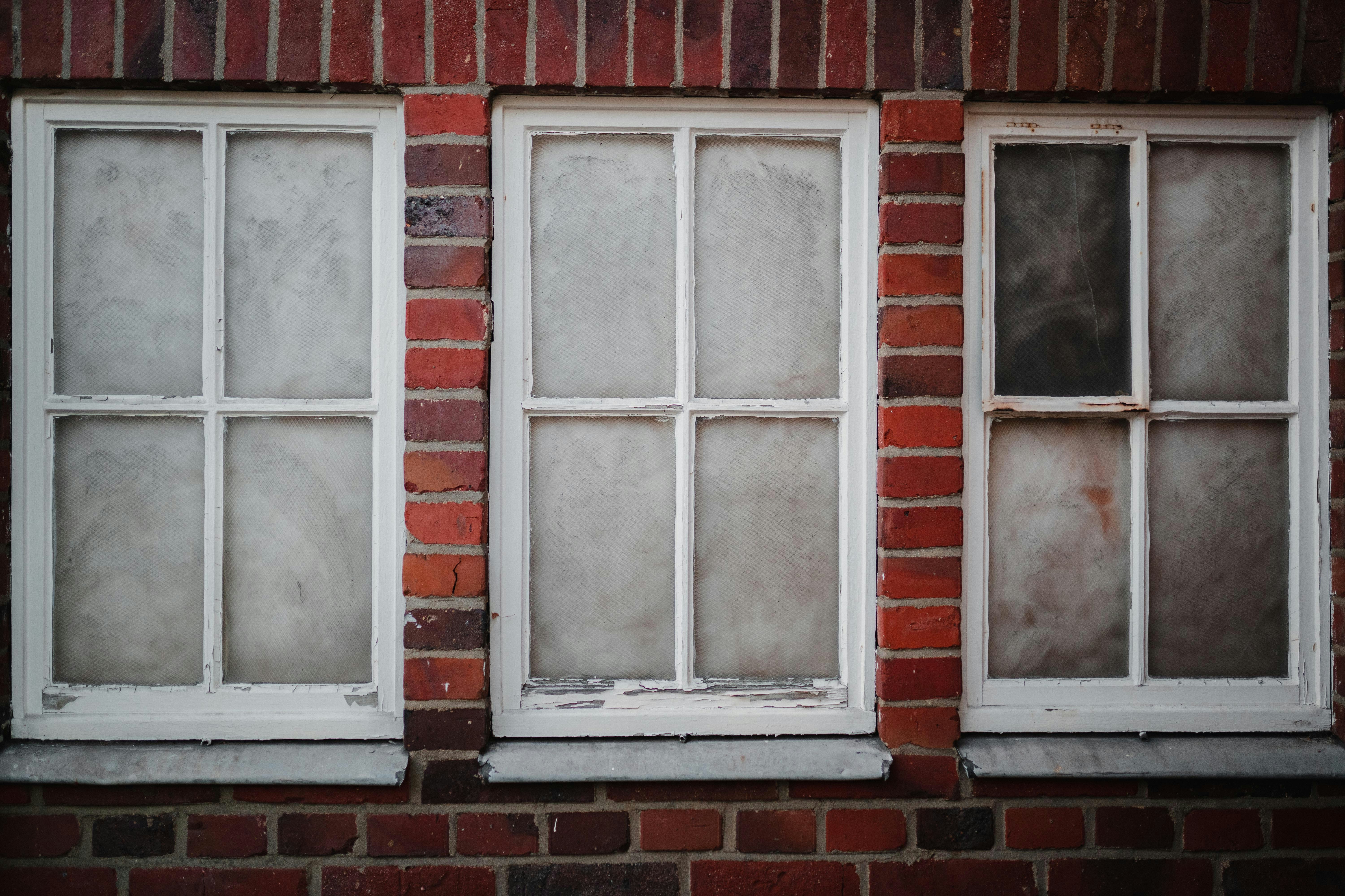 white wooden framed glass window